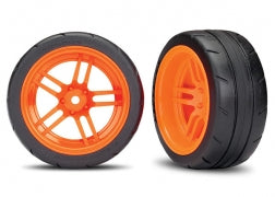 Traxxas 8374A Tires and wheels, assembled, glued (split-spoke orange wheels, 1.9' Response tires) (extra wide, rear) (2) (VXL rated)