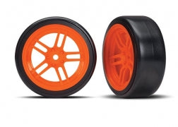 Traxxas 8376A Tires and wheels, assembled, glued (split-spoke orange wheels, 1.9' Drift tires) ( front)